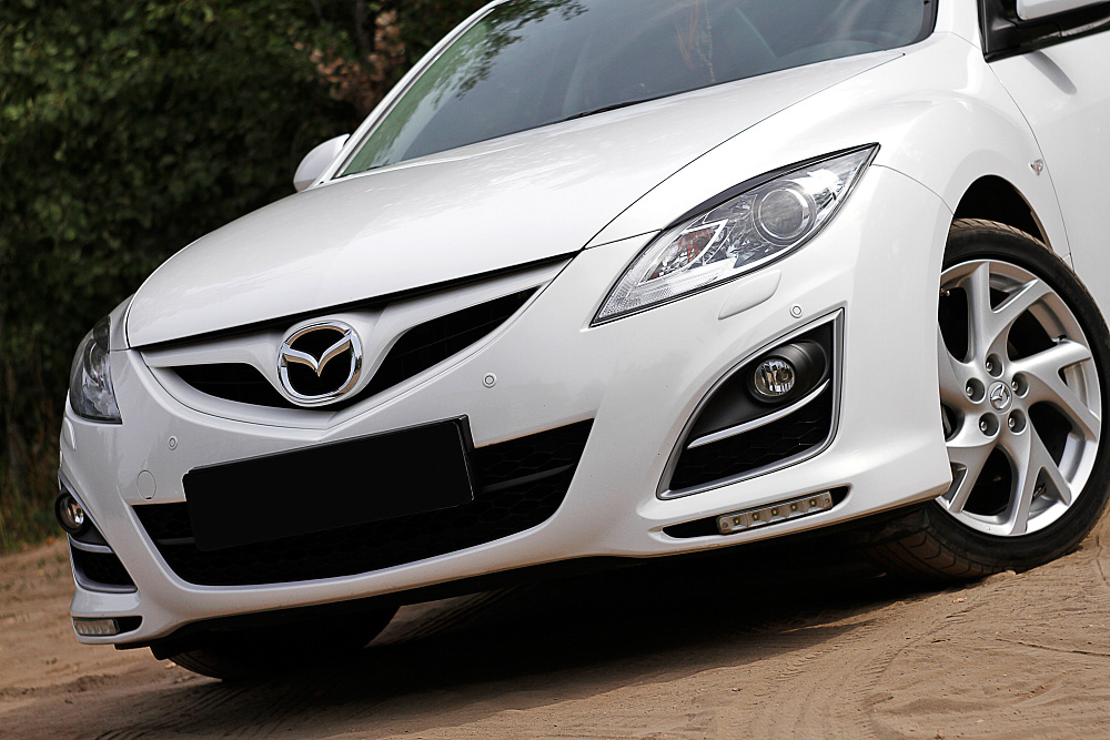картинка Mazda 6 2010—2012 Накладки на передние фары (реснички) компл.-2 шт. от магазина  StreetTuning