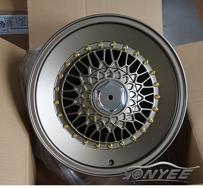 картинка Новые диски BBS RS R16 4X100/4X108 ET25 J8,5 темно золотой глянец + золотые болтики + полированная полка магазин  StreetTuning 